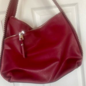 Rose berry oversized purse with silver studs for accent.  Lots of space